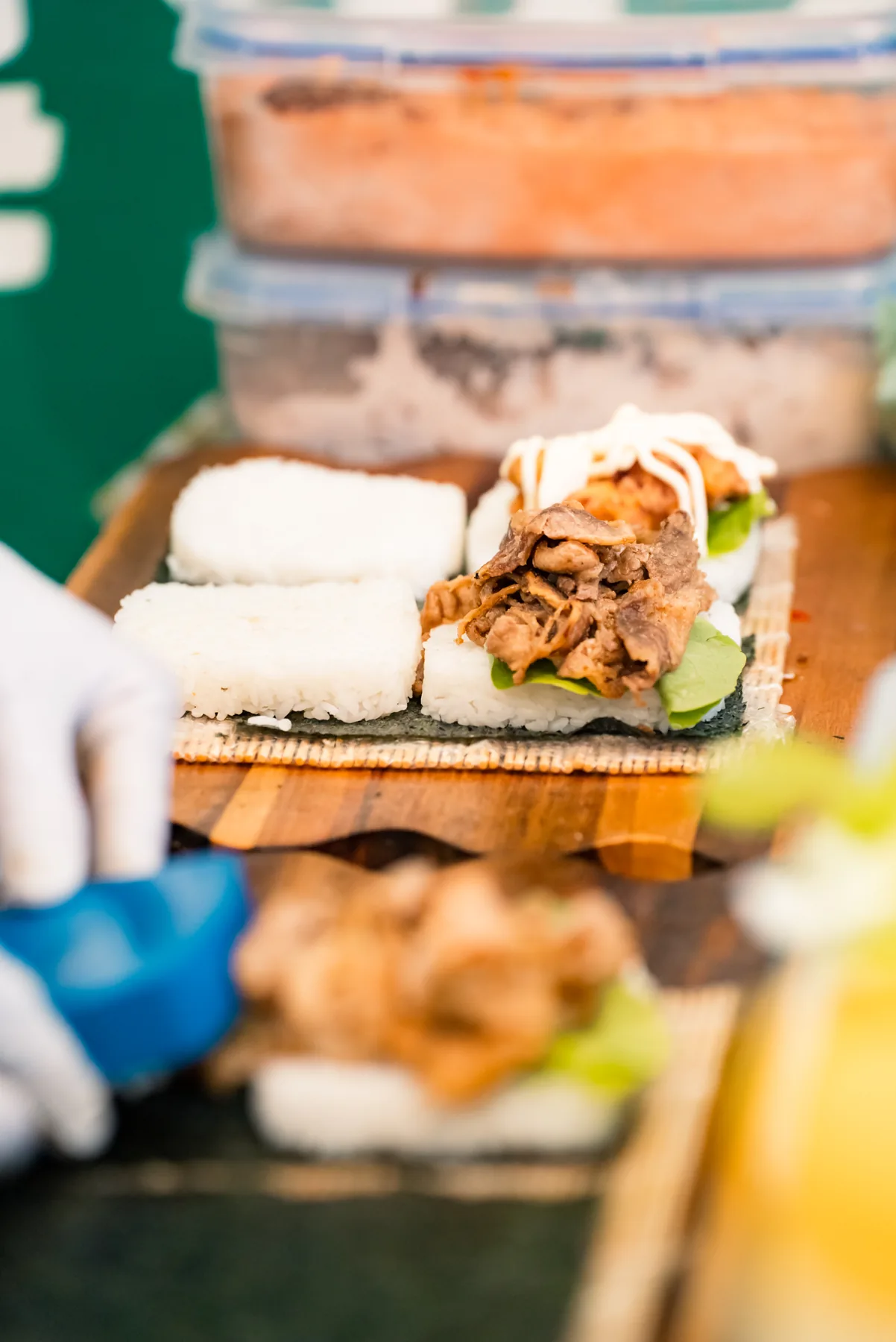 Oh!NIGIRI rice burger being assembled by hand at the stall